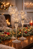 Festive table with glowing candle holders