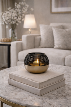 Tealight glow on stacked books