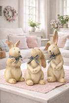 Pastel bunny figurines on coffee table