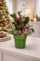 Festive holiday arrangement on console table