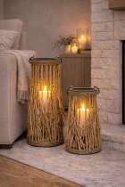 Rustic lanterns glowing by the sofa