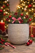 Festive greenery in a stone planter