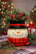 Festive snowman planter with holiday decor