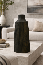 Minimalist dark vase in serene living room