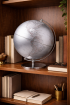 Globe and books on a bookshelf