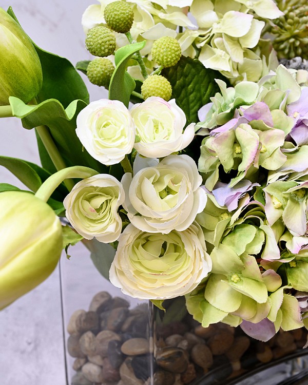 Hydrangea, Tulip and Sedium in a clear glass square vase in faux water