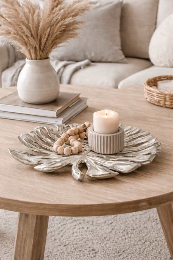 Decorative silver monstera leaf tray arrangement