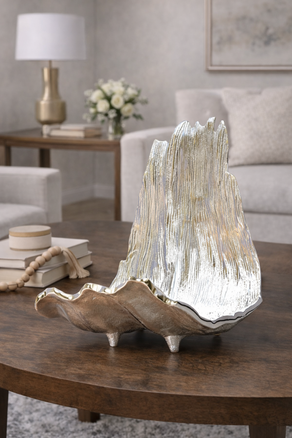 Decorative shell centerpiece on wooden console