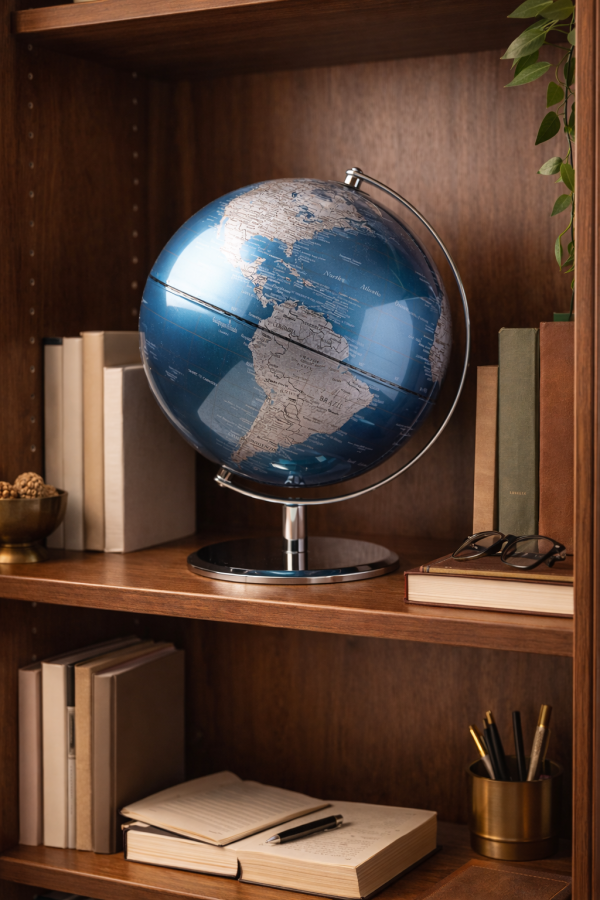 Globe on a walnut bookshelf display