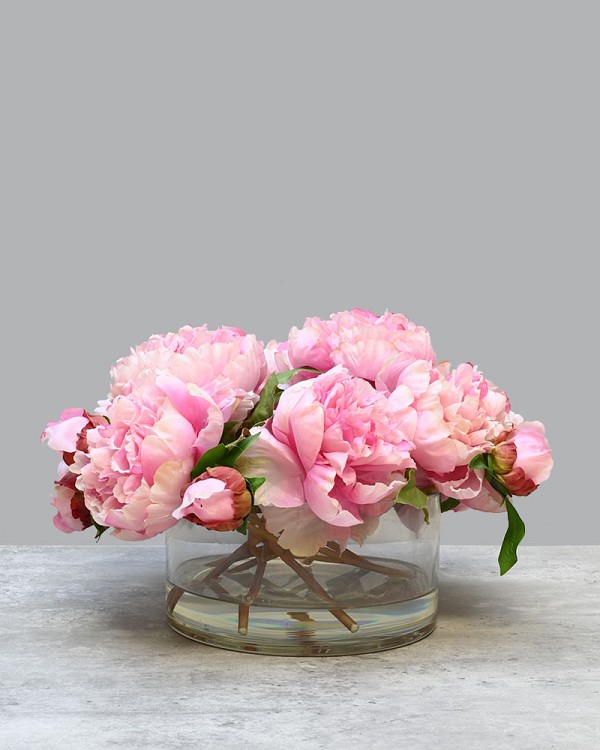Round glass vase with Pink Peonies in faux water